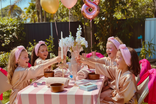 Girls raising flutes in celebration